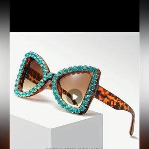 Glamorous turquoise trimmed with rhinestones